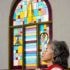 Stained glass arched window with flowers